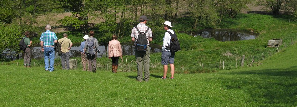 Ryenats members overlooking pond